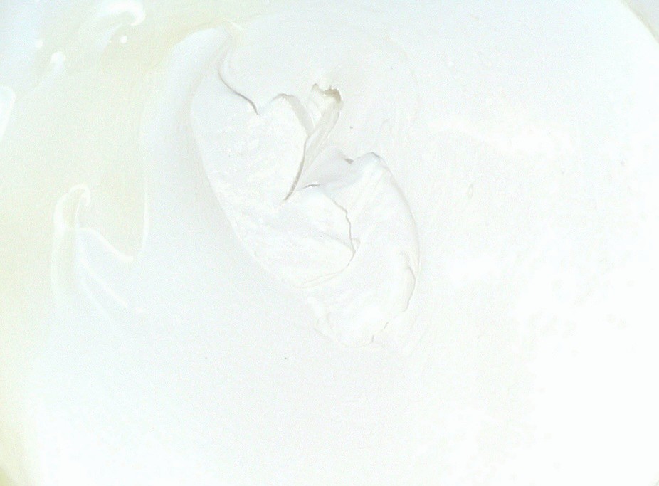 Bentonite greases and pastes